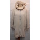 Tommy Hilfger and Hoss- Two ladies cream coats comprising a Hilfiger coat with fleece lining and