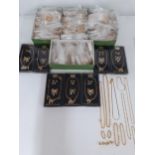 A large quantity of unopened gold tone modern chains and earrings together with 7 boxed Rancroft