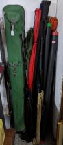 A mixed lot of fishing rods and accessories to include a Fighter Match and an Angler 12ft carbon