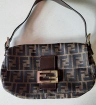 Fendi-A 1990's/2000's Zucca Baguette shoulder bag in brown leather with silver tone hardware and