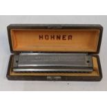 A Hohner harmonica 64 Chromonica Octaves professional model, cased Location: 7:2