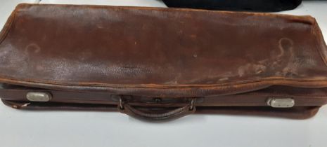 A vintage brown textured leather Gladstone bag of long proportions 28" long x 10" high with fabric