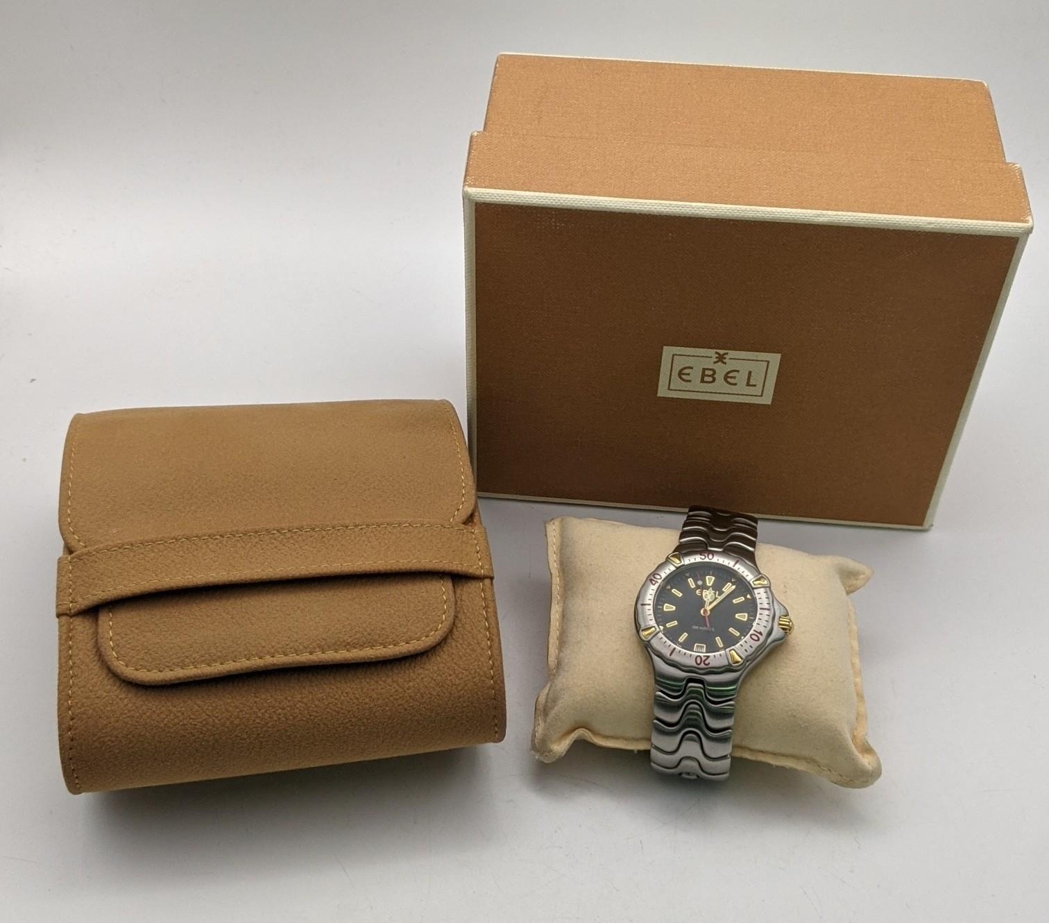 A gent's Ebel Sportwave Quartz wrist watch with its box Location: