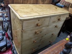 A Victorian pine chest of two short and three long drawers on turned legs 98x100x49.5cms Location: