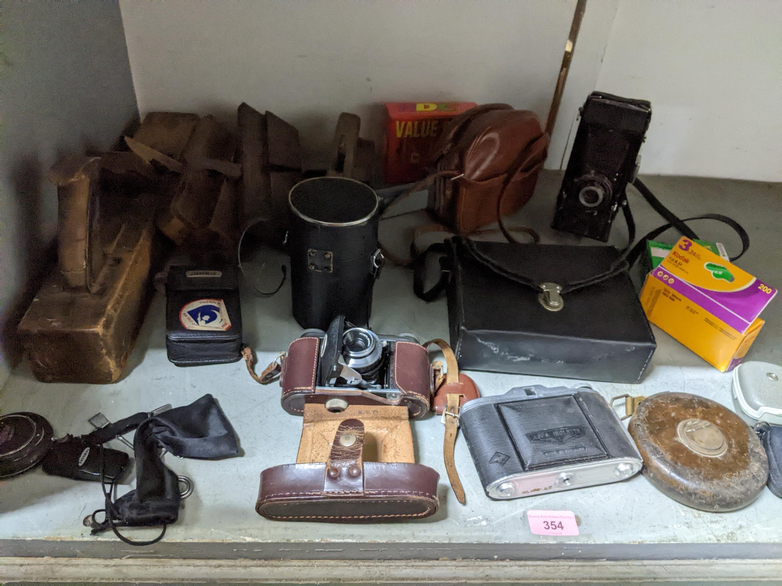 A selection of vintage wooden woodworking planes, and camera equipment to include a Zeiss Ikon