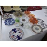 A mixed lot of ceramics and glassware to include a pair of twin handled Noritake vases, three orange