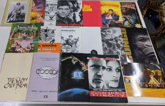 A collection of film brochures and campaign books to include E.T, Flash Gordon, Teenage Mutant Ninja