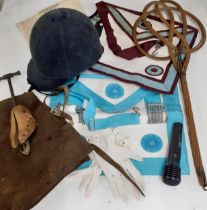 A miscellaneous lot to include 2 Masonic aprons, a US Mint money bag, a Sound of Natural WM-308G