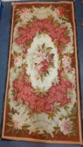 A 20th Century Aubusson rug A/F originally purchased from the C John Mayfair Gallery having a pink