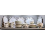 A Shelley 'Wild Roses' part dinner service comprising dinner plates, side plates cups and saucers,