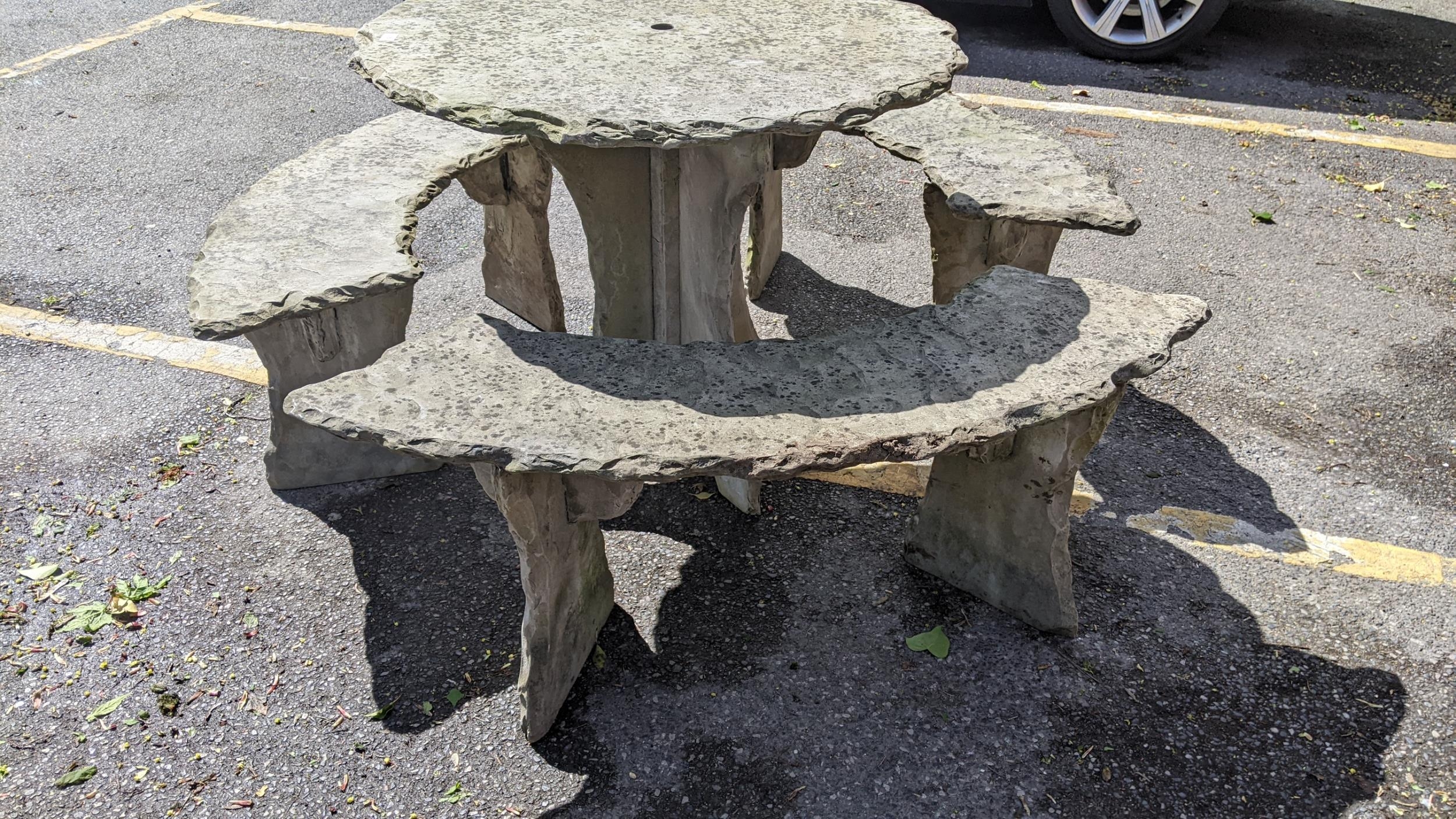 A modern carved slate circular garden table and three benches to - Image 2 of 6