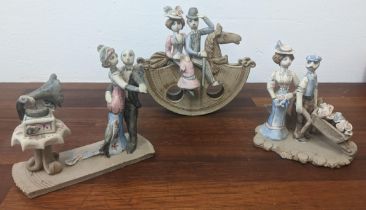 Three Hilary Brock Figures to include a couple on a rocking horse Location: 4:2