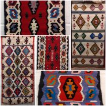 A group of 5 small Kelim rugs in vibrant geometric patterns, various sizes two 19x38", 28x56",