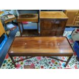 A Mahogany coffee table with galleried top, c-scroll corner brackets, pierced cross stretchers, a