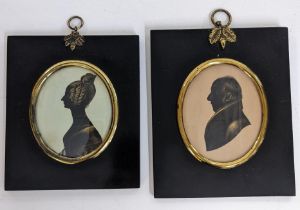 Two 19th century silhouette portrait miniatures with gilt highlights Location: Cab