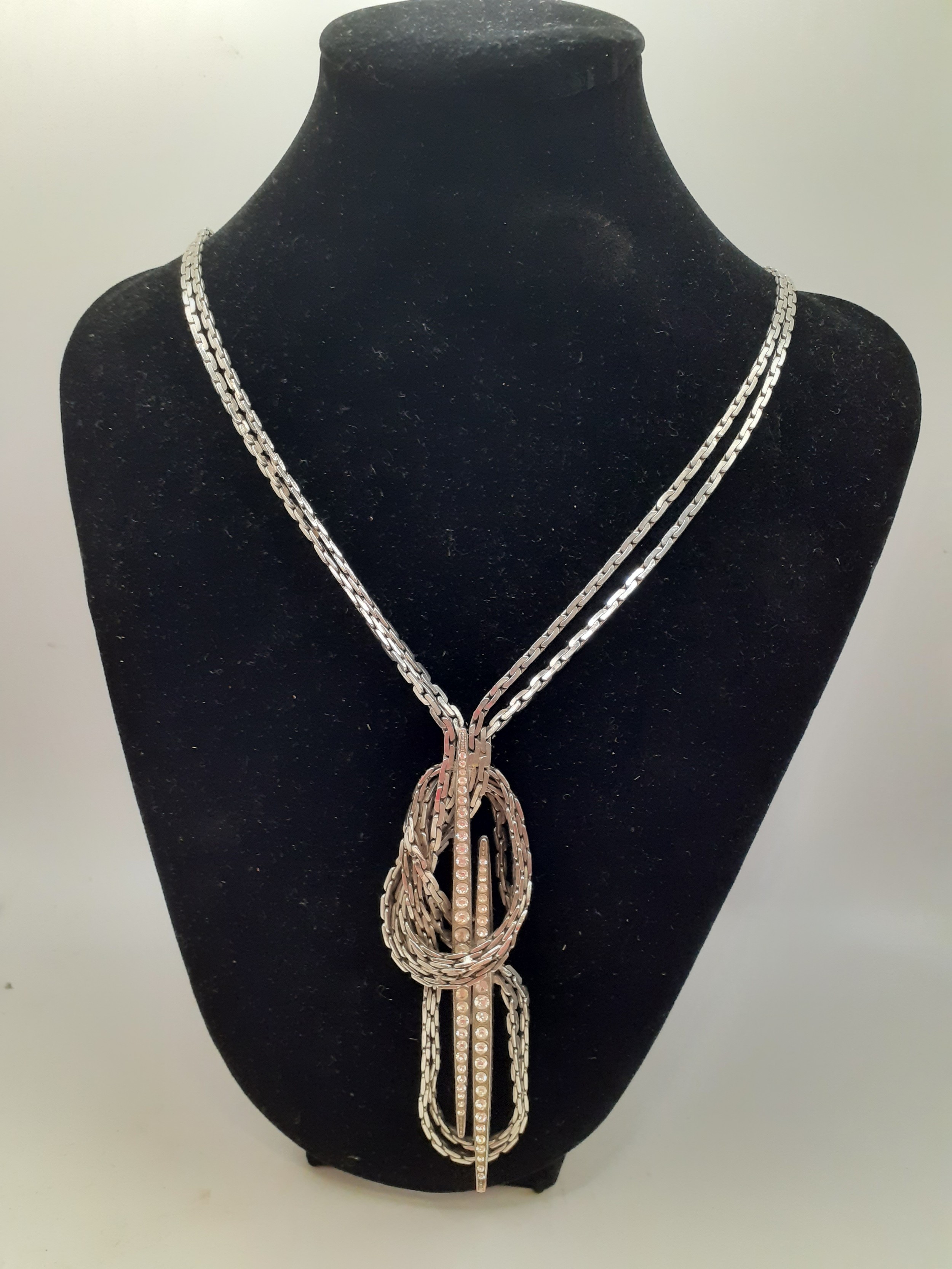 Chanel-A 1999 Autumn Collection silver tone necklace with white crystal detail having a double chain