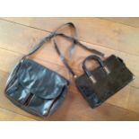 Two vintage bags comprising a Suzy Smith black leather handbag 31cm Wide x 21cm High having a mock