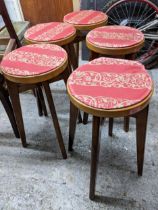 A group of five mid-century Benchairs stools with fabric tops Location: