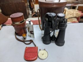 A group of leather cased items to include a Fowler's calculator in a red leather case, a Barr and