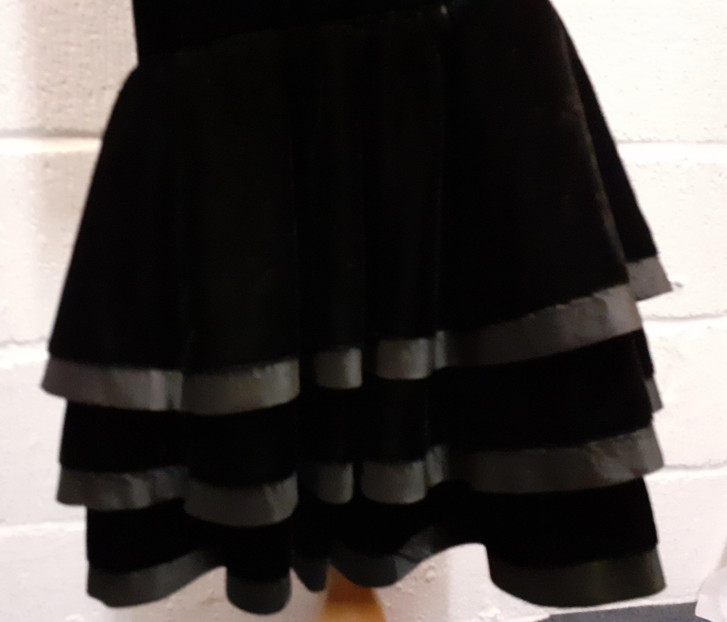 Louis Feraud-A 1980's black cocktail dress having a plunged back with bow detail and a 3 tiered - Image 5 of 6