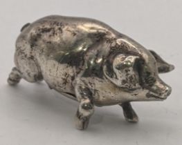 A late 19th/early 20th century silver snuff box fashioned as a pig stamped 800 Location: