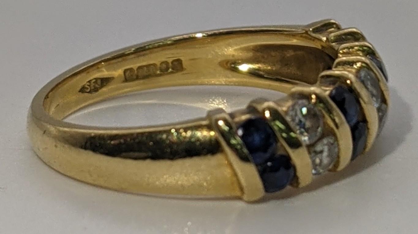 An 18ct gold diamond and sapphire ring 4.4g Location: - Image 2 of 2