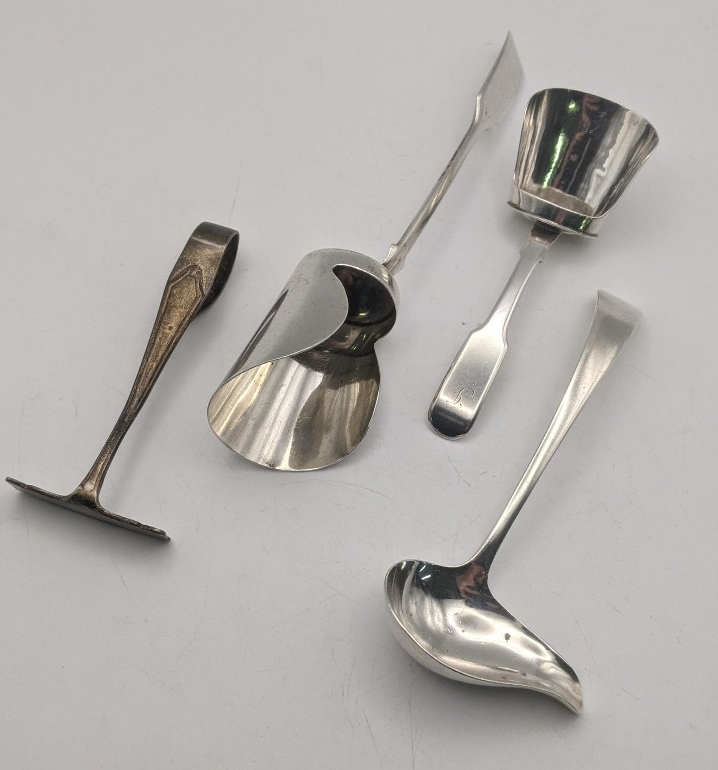 Mixed silver utensils to include a fiddle pattern tea caddy spoon, together with a fiddle pattern