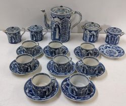 A Chinese style blue and white transfer printed tea set, decorated with panels of figures among a