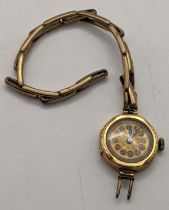 A 18ct gold ladies manual wind wristwatch A/F, on a later gold plated bracelet, total weight 15.4g