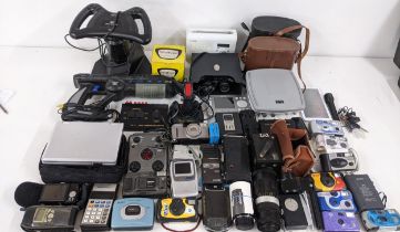 A collection of electronics to include cameras, a Junior Box Brownie, gaming accessories, vintage