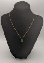 A gold and jade bracelet on a 14ct gold necklace 2.7g Location:
