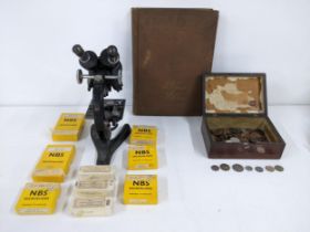 A Victorian box containing a collection of British coins and Coins of the World, along with a Beck