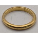 A 22ct gold wedding band 5.1g, size P Location: