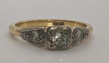 A 18ct gold ladies three stone diamond ring, size M 1/2, 3.2g Location: