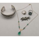 Jewellery to include on Egyptian silver bracelet, a 9ct gold on green glass necklace, 3.8g, two