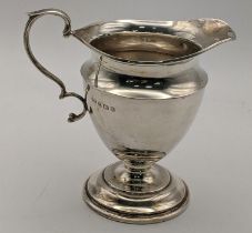 Mixed silver to include a silver cream jug hallmarked Birmingham 193, 105.3g Location: