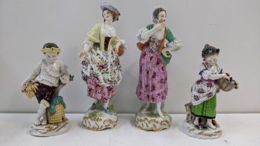 Two 19th century German porcelain figures of two ladies, together with a pair of Naples figures of a