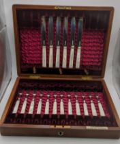 A part filled canteen of silver and mother of pearl cutlery to include 12 desert forks and six