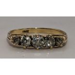 An 18ct gold five-stone diamond ring (one stone missing) 3g Location: