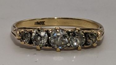 An 18ct gold five-stone diamond ring (one stone missing) 3g Location: