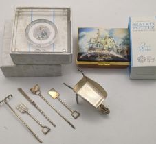 A modern set of silver miniature garden tools and a wheelbarrow 50g, a Halcyon Days enamelled box,