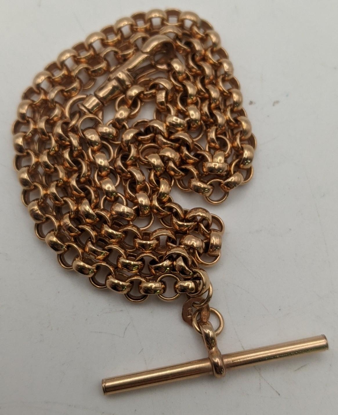 A 9ct rose gold pocket watch chain with a bulldog clip and T-bar, total weight 10.6g Location: - Image 2 of 2