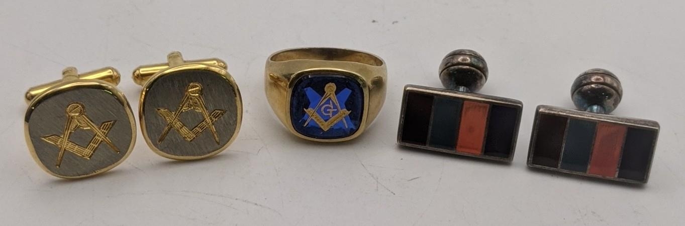 A gold coloured gents masonic ring set with a blue stone, decorated in gilt 585 9.6g together with a
