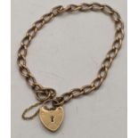 A 9ct gold ladies bracelet having a hear shaped padlock clasp, 8.8g Location: