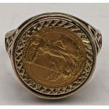 A 1/10 Britannia 1987 gold coin mounted in a 9ct gold ring, total weight 6.9g Location: