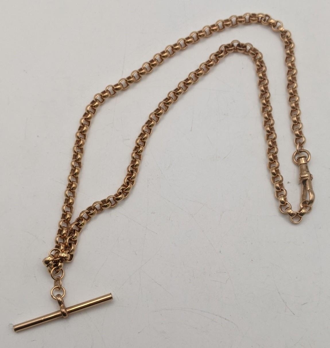 A 9ct rose gold pocket watch chain with a bulldog clip and T-bar, total weight 10.6g Location: