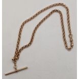A 9ct rose gold pocket watch chain with a bulldog clip and T-bar, total weight 10.6g Location: