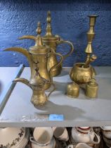 Brassware to include Saudi Arabian coffee pots, pestle and mortar and other items Location: