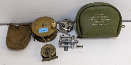 Four assorted fishing reels to include a C Farlow & Co, a J B Mascorp of Manchester reel, and two