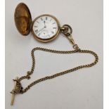 A Waltham gold plated Hunter pocket watch initialled, with a gold plated watch chain Location: Cab